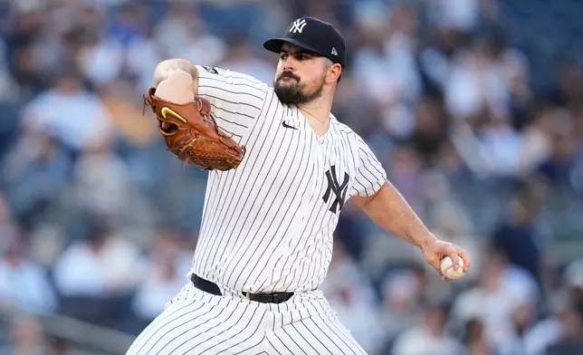 New York Yankees' Carlos Rodón pitches during the first inning of a baseball game against the Chicago White Sox Wednesday, June 17, 2026, in New York. (AP Photo/Frank Franklin II)