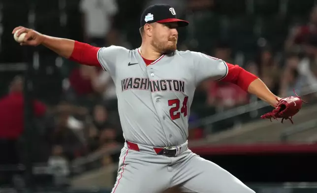 Washington Nationals pitcher Cade Cavalli throws against the Arizona Diamondbacks in the first inning of a baseball game, Sunday, June 7, 2026, in Phoenix. (AP Photo/Rick Scuteri)