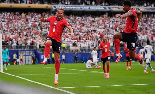 England’s Harry Kane (9) celebrates with England's Jude Bellingham (10) after scoring their second goal during the World Cup Group L soccer match between Panama and England in East Rutherford, N.J., near New York, Saturday, June 27, 2026. (AP Photo/Steve Luciano)