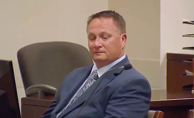 FILE - Former paramedic Jeremy Cooper, who injected Elijah McClain with ketamine before his death, sits in court for sentencing, Friday, April 26, 2024, in the Brighton, Colo. (ABC News One/Pool via AP, File)