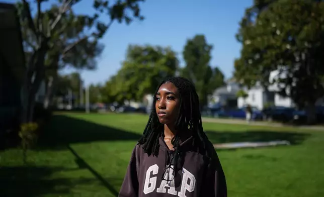 Makeda Walker-Deen, a junior at Susan Miller Dorsey Senior High School, stands for a photo in Los Angeles, Thursday, May 14, 2026. (AP Photo/Jae C. Hong)