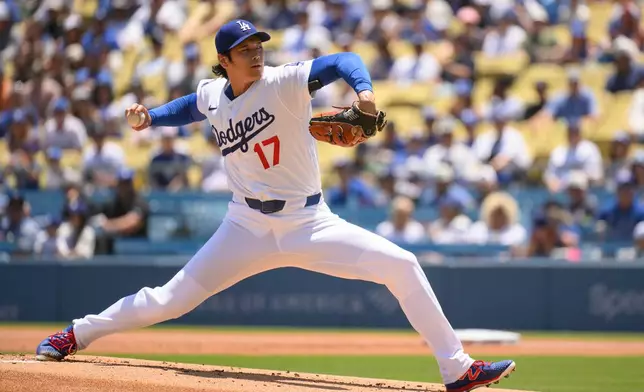 Los Angeles Dodgers starting pitcher Shohei Ohtani delivers during the first inning of a baseball game against the Tampa Bay Rays in Los Angeles, Wednesday, June 17, 2026. (AP Photo/Kyusung Gong)