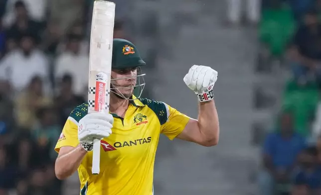 Australia's Cameron Green celebrates after scoring fifty runs during the second one-day international cricket match between Pakistan and Australia, in Lahore, Pakistan, Tuesday, June 2, 2026. (AP Photo/K.M. Chaudary)