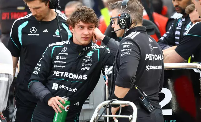 Mercedes driver Andrea Kimi Antonelli, of Italy, stands at the pit after the red flag during the Formula One Monaco Grand Prix race at the Monaco racetrack, Sunday, June 7, 2026. (Yves Herman, Pool Photo via AP)