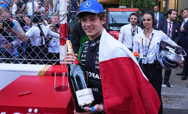 Mercedes driver Andrea Kimi Antonelli, of Italy, reacts after winning the Formula One Monaco Grand Prix race at the Monaco racetrack, Sunday, June 7, 2026. (AP Photo/Fatima Shbair)