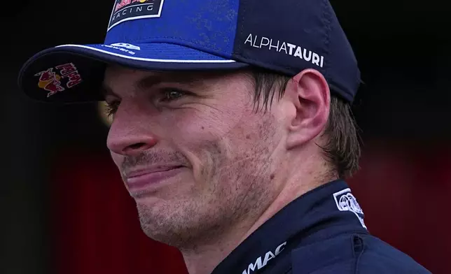 Red Bull driver Max Verstappen of the Netherlands smiles after the qualifying session for the Monaco F1 Grand Prix, at the Monaco racetrack, Saturday, June 6, 2026. (AP Photo/Fatima Shbair)