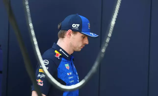 Red Bull driver Max Verstappen, of the Netherlands, reacts at the pit during the Formula One Monaco Grand Prix race at the Monaco racetrack, Sunday, June 7, 2026. (Yves Herman, Pool Photo via AP)