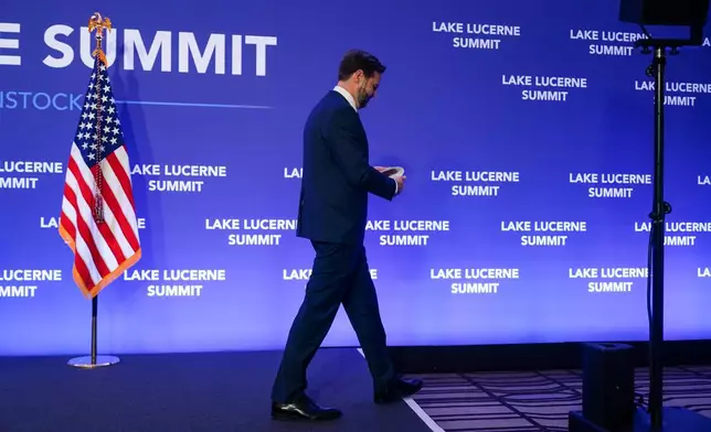 Vice President JD Vance walks after speaking to members of the media following high-level talks between the U.S. and Iran at the Bürgenstock Resort in Obbuergen, near Lucerne, in Switzerland, Monday, June 22, 2026. (Nathan Howard/Pool Photo via AP)
