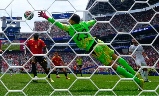 Egypt goalkeeper Mostafa Shoubir (23) makes a save during the World Cup Group G soccer match between Belgium and Egypt in Seattle, Monday, June 15, 2026. (AP Photo/Manu Fernandez)