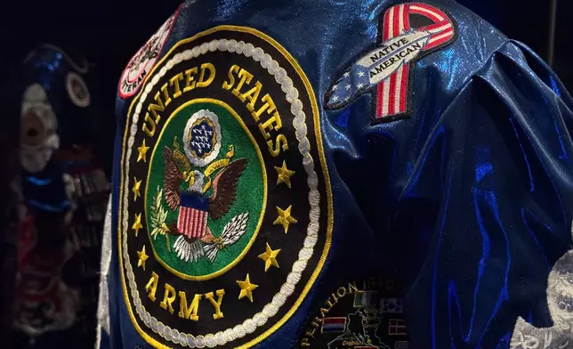 A contemporary color guard dress worn by members of the Native American Women Warriors is displayed at the Smithsonian's National Museum of the American Indian in Washington, on Saturday, May 23, 2026. (Jourdan Bennett-Begaye/ICT via AP)