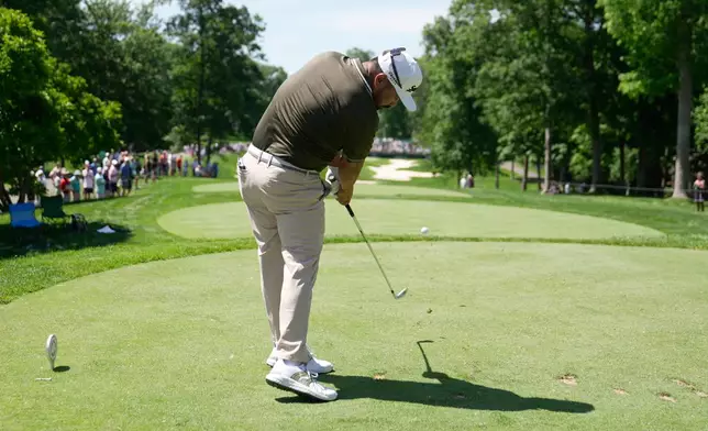 J.J. Spaun, of the United States, hits from the eighth tee during the first round of the Memorial golf tournament in Dublin, Ohio, Thursday, June 4, 2026. (AP Photo/Sue Ogrocki)