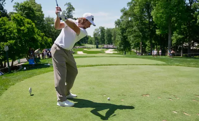 Tommy Fleetwood, of England, hits from the eighth tee during the first round of the Memorial golf tournament in Dublin, Ohio, Thursday, June 4, 2026. (AP Photo/Sue Ogrocki)