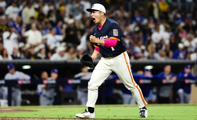 San Diego Padres' Yuki Matsui reacts after the final out of the sixth inning inning of a baseball game against the Los Angeles Dodgers Friday, June 26, 2026, in San Diego. (AP Photo/Derrick Tuskan)