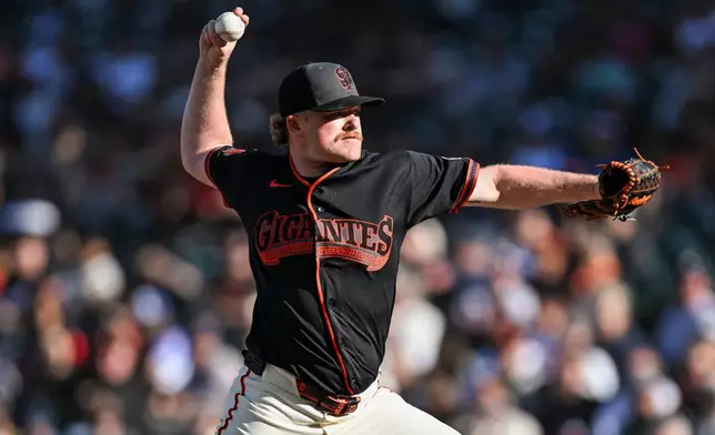 San Francisco Giants pitcher Logan Webb (62) throws to a Atlanta Braves batter during the first inning of a baseball game, Saturday, June 27, 2026, in San Francisco (AP Photo/Justine Willard)