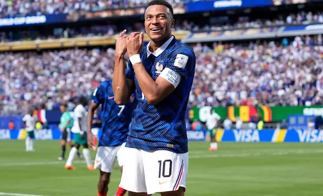 France's Kylian Mbappe celebrates after scoring the opening goal of his team during the World Cup Group I soccer match between France and Senegal in East Rutherford, N.J., near New York, Tuesday, June 16, 2026. (AP Photo/Frank Franklin II)