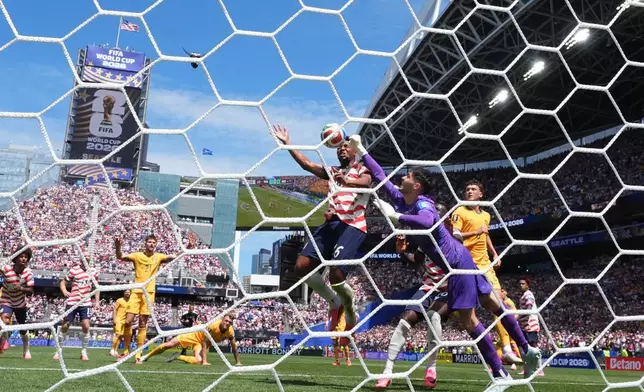 United States' Alex Freeman (16) scores their second goal during the World Cup Group D soccer match between the United States and Australia in Seattle, Friday, June 19, 2026. (AP Photo/Lindsey Wasson)