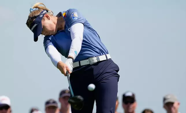 Brooke M. Henderson, of Canada, hits her tee shot on the third hole during the third round at the Women's PGA Championship golf tournament at the Hazeltine National Golf Club, Saturday, June 27, 2026, in Chaska, Minn. (AP Photo/Chris Carlson)