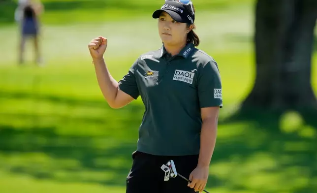 Haeran Ryu, of South Korea, celebrates after a eagle one the seventh hole during the third round at the Women's PGA Championship golf tournament at the Hazeltine National Golf Club, Saturday, June 27, 2026, in Chaska, Minn. (AP Photo/Chris Carlson)