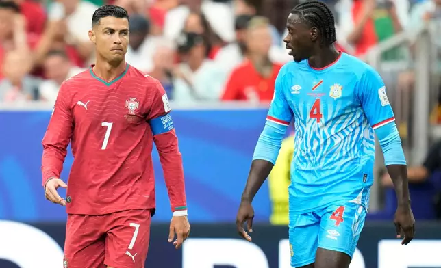 Portugal's Cristiano Ronaldo, left, and Congo's Axel Tuanzebe react during the World Cup Group K soccer match between Portugal and Congo in Houston, Wednesday, June 17, 2026. (AP Photo/Karen Warren)