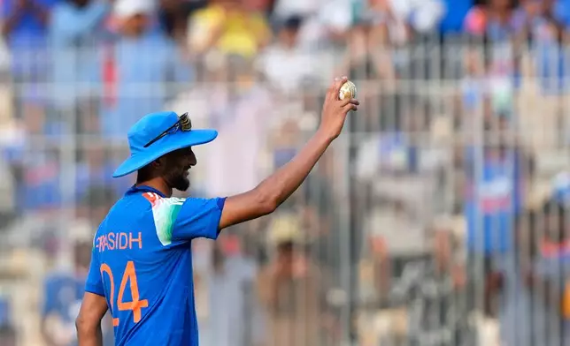 India's Prasidh Krishna holds the ball up after taking five wickets in the first innings of the third ODI cricket match between Afghanistan and India in Chennai, India, Saturday, June 20, 2026. (AP Photo/Mahesh Kumar A.)