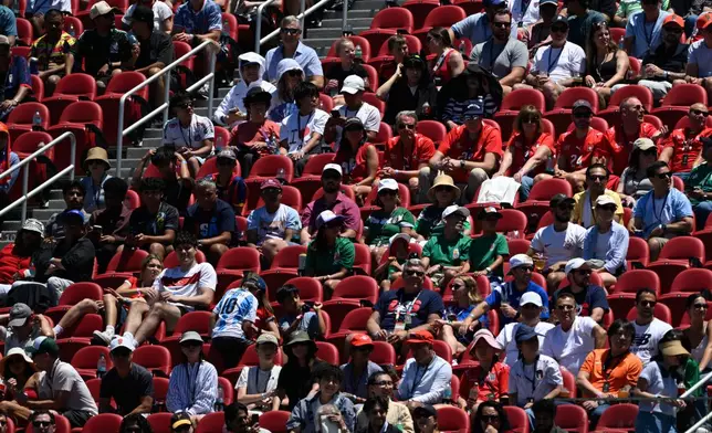 Fans watch from the stands during the World Cup Group B soccer match between Qatar and Switzerland in Santa Clara, Calif., near San Francisco, Saturday, June 13, 2026. (AP Photo/Eakin Howard)