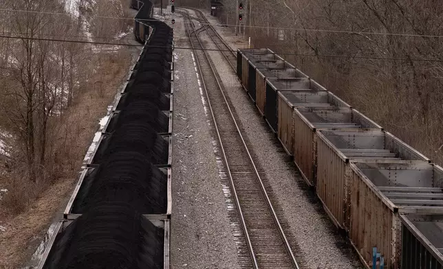 FILE - A train with coal pauses on the tracks in Grafton, W.Va., March 18, 2026. (AP Photo/Carolyn Kaster, File)