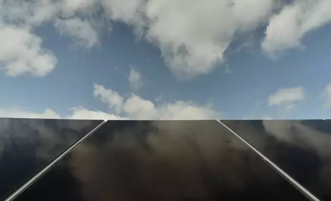 FILE - Solar panels operate April 28, 2026, at a farm in Christiana, Tenn. (AP Photo/Joshua A. Bickel, File)