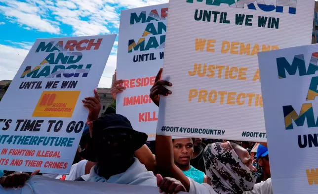 FILE - South Africans protest against illegal migration, in Johannesburg, South Africa, April 29, 2026. (AP Photo/Themba Hadebe, File)