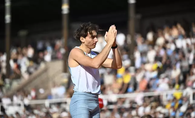 Sweden's Armand Duplantis reacts after the men's pole vault competition at the IAAF Diamond League athletics meeting in Stockholm, Sweden, Sunday, June 7, 2026. (Christine Olsson/TT News Agency via AP)