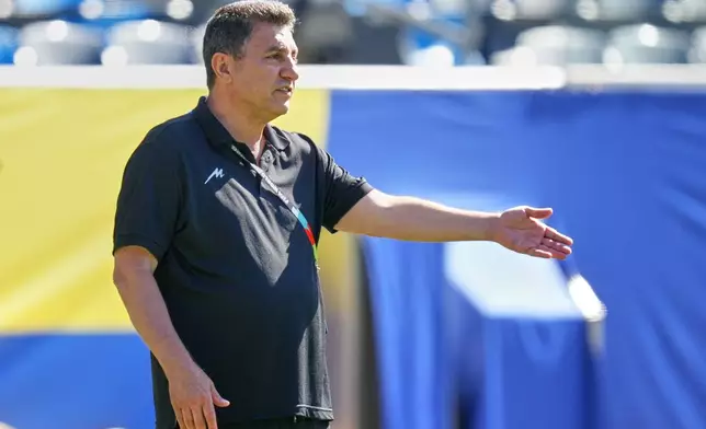 Iran head coach Amir Ghalenoei attends a training session ahead of a FIFA World Cup match against Belgium in Carson, Calif., Saturday, June 20, 2026. (AP Photo/Andre Penner)