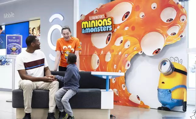 Xfinity members seen at an Xfinity Store, on Monday, June 15, 2026, experiencing Xfinity's activation for Illumination's Minions & Monsters featuring exclusive AR experiences, collectible drops and photo moments. King of Prussia, Penn. (Ryan Collerd/AP Content Services for Comcast)