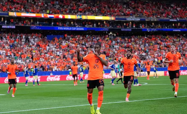 Netherlands' Crysencio Summerville celebrates after scoring his side's fifth goal during the World Cup Group F soccer match between the Netherlands and Sweden in Houston, Saturday, June 20, 2026. (AP Photo/Ashley Landis)