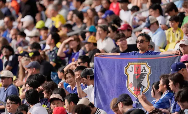 Fans cheer for the Japan national team during a training session Monday, June 8, 2026, in Nashville, Tenn., ahead of the World Cup soccer tournament. (AP Photo/George Walker IV)