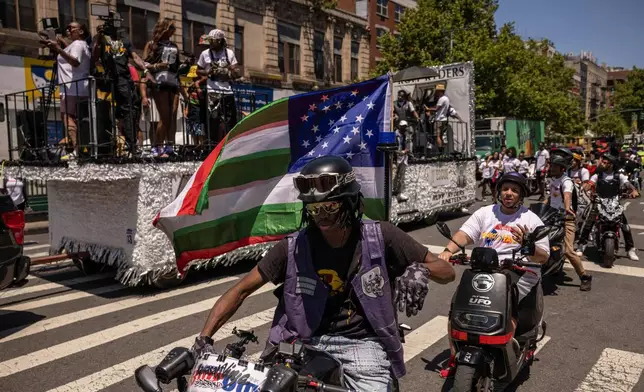 FILE - People on motorcycles participate in the 31st annual Juneteenth celebration, June 15, 2024, in the Harlem neighborhood of New York. (AP Photo/Yuki Iwamura, File)