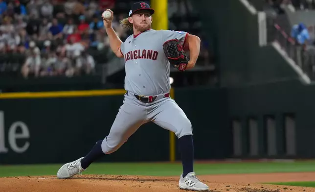 Cleveland Guardians starting pitcher Tanner Bibee throws during the first inning of a baseball game against the Texas Rangers, Saturday, June 6, 2026, in Arlington, Texas. (AP Photo/LM Otero)