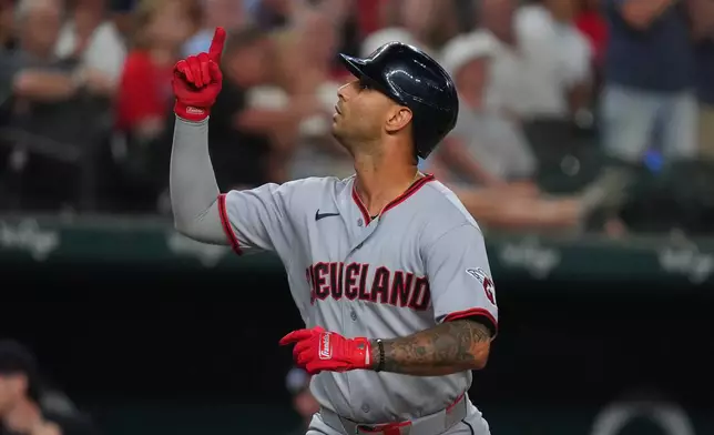Cleveland Guardians' Brayan Rocchio celebrates after his home run during the fifth inning of a baseball game against the Texas Rangers, Saturday, June 6, 2026, in Arlington, Texas. (AP Photo/LM Otero)