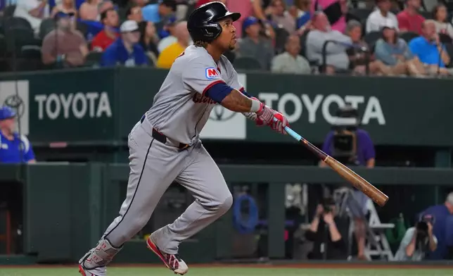 Cleveland Guardians' José Ramírez watches his home run sail into center field during the fourth inning of a baseball game against the Texas Rangers, Saturday, June 6, 2026, in Arlington, Texas. (AP Photo/LM Otero)