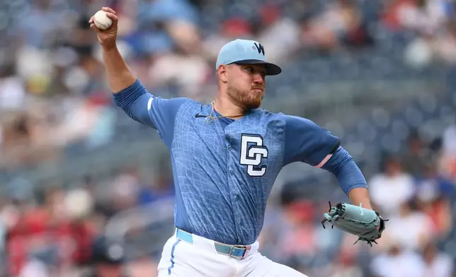 Washington Nationals pitcher Cade Cavalli throws during the third inning of a baseball game against the Seattle Mariners, Saturday, June 13, 2026, in Washington. (AP Photo/Nick Wass)
