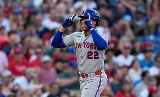 New York Mets' Juan Soto reacts after hitting a home run against Philadelphia Phillies pitcher Aaron Nola during the third inning of a baseball game Thursday, June 18, 2026, in Philadelphia. (AP Photo/Matt Slocum)