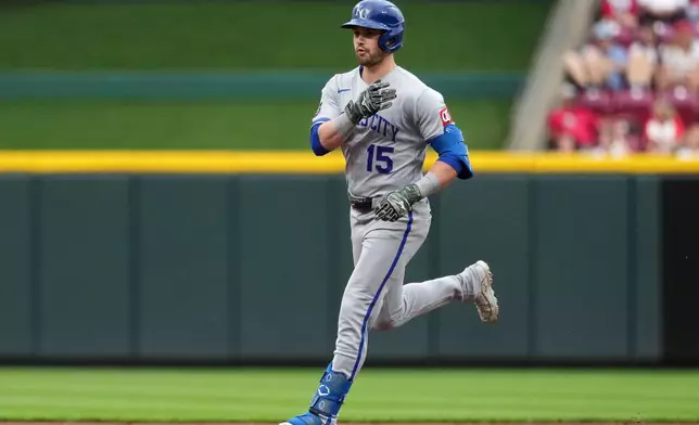 Kansas City Royals' Lane Thomas rounds the bases after hitting a grand slam during the first inning of a baseball game against the Cincinnati Reds, Monday, June 1, 2026, in Cincinnati. (AP Photo/Kareem Elgazzar)
