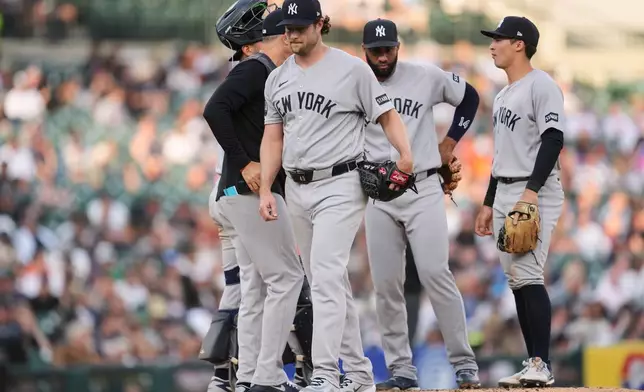New York Yankees pitcher Gerrit Cole walks to the dugout against the Detroit Tigers during the fifth inning of a baseball game Monday, June 22, 2026, in Detroit. (AP Photo/Paul Sancya)
