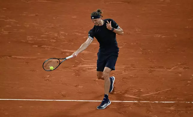 Germany's Alexander Zverev returns to Spain's Rafael Jodarduring the quarterfinal tennis match at the French Open in Paris, Tuesday, June 2, 2026. (AP Photo/Emma Da Silva)