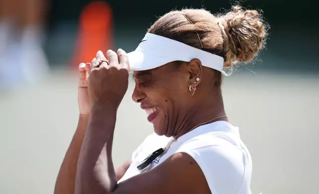 Serena Williams of the U.S. reacts during a practice session, ahead of the Wimbledon Tennis Championships, at the All England Lawn Tennis and Croquet Club, in London, Saturday June 27, 2026. (John Walton/PA via AP)