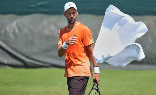 Novak Djokovic or Serbia attends a practice session ahead of the Wimbledon Tennis Championships, in London, Wednesday, June 24, 2026. (AP Photo/Kin Cheung)