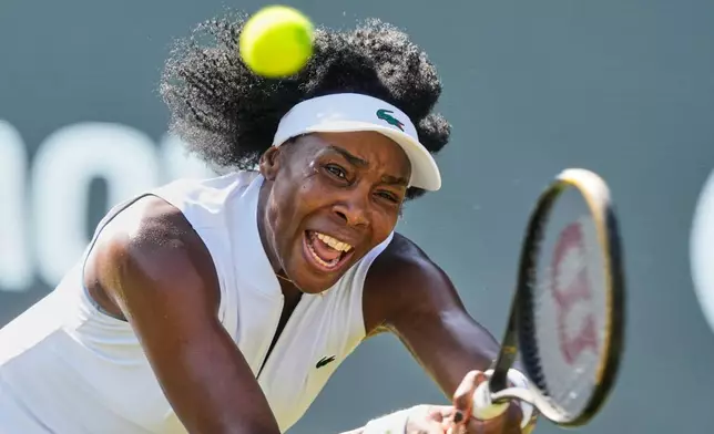United States' Venus Williams returns the ball to Romania's Irina Camelia Begu during their round of 32 match at the Bad Homburg Open WTA tennis tournament in Bad Homburg, Germany, Monday, June 22, 2026. (AP Photo/Michael Probst)