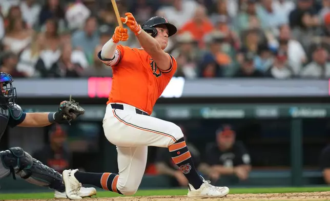 Detroit Tigers' Kerry Carpenter hits a two-run home run against the Seattle Mariners during the third inning of a baseball game Friday, June 5, 2026, in Detroit. (AP Photo/Paul Sancya)