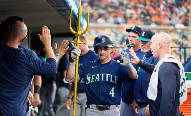 Seattle Mariners' Colt Emerson celebrates his home run against the Detroit Tigers during the seventh inning of a baseball game Friday, June 5, 2026, in Detroit. (AP Photo/Paul Sancya)