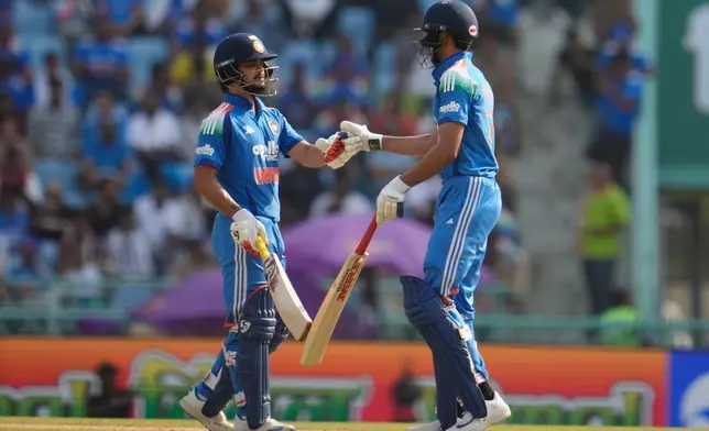 India's captain Shubman Gill, right, and Ishan Kishan celebrate after scoring run during the second ODI cricket match between India and Afghanistan in Lucknow, India, Wednesday, June 17, 2026. (AP Photo/Manish Swarup)