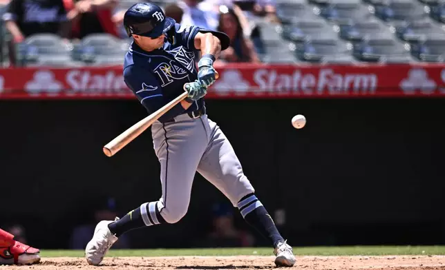 Tampa Bay Rays' Ben Williamson hits a home run during the fourth inning of a baseball game against the Los Angeles Angels, Sunday, June 14, 2026, in Anaheim, Calif. (AP Photo/William Liang)