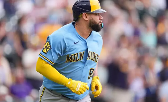Milwaukee Brewers' Gary Sánchez heads up the first base line after hitting a two-run home run off Colorado Rockies relief pitcher Jaden Hill in the sixth inning of a baseball game Sunday, June 7, 2026, in Denver. (AP Photo/David Zalubowski)